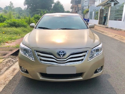 Bán Toyota Camry LE 2010 màu vàng xe zin nguyên như mới.