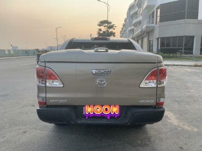 Cần bán xe BT50, sản xuất 2014, số sàn, máy dầu, hai cầu, màu ánh kim